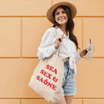 mockup-of-a-female-tourist-carrying-a-tote-bag-41718-r-el2